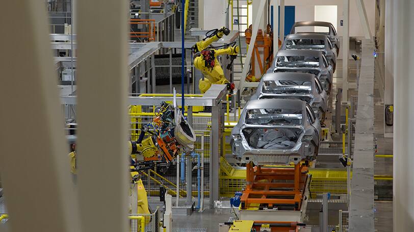 Five 2015 Chrysler 200 bodies on State of the Art Manufacturing facility line